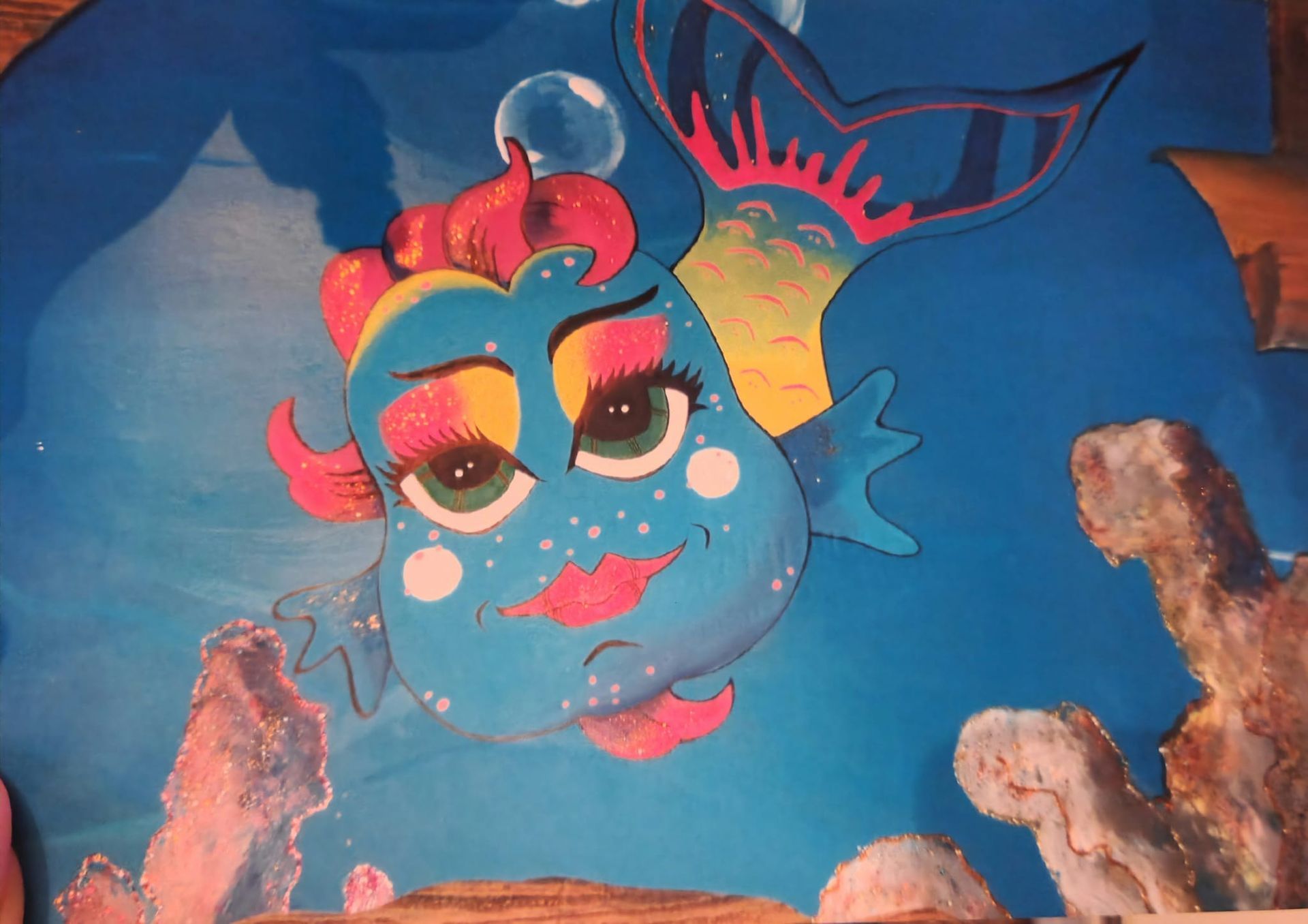 A painting of a fish with bubbles coming out of it 's mouth artist kids room