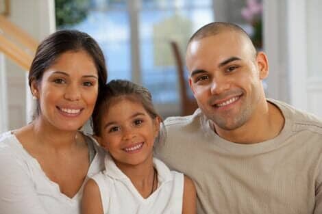 Portrait of a Hispanic family smiling - preventative dentistry in Pawtucket, RI / Portrait of a Hispanic family smiling - preventative dentistry in Pawtucket, RI