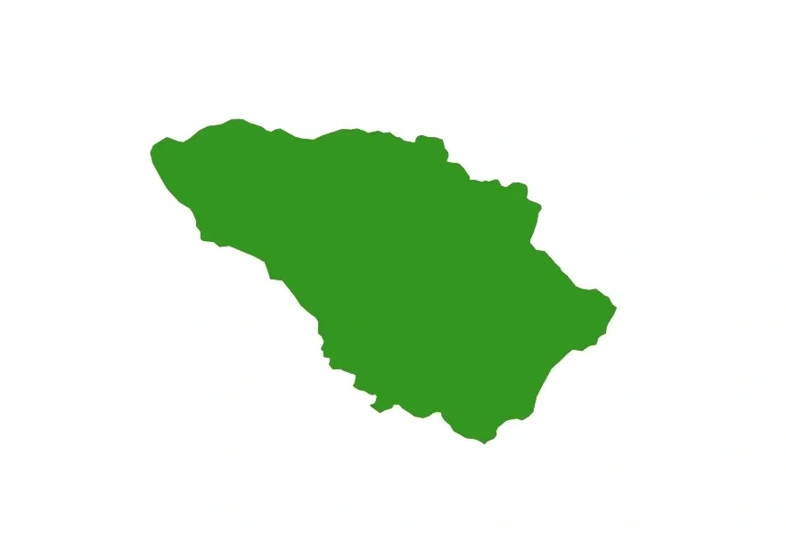 Green silhouette of a landmass, likely an island or coastal region, on a white background.