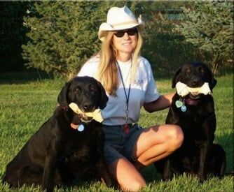 Woman with Two Dogs — Bozeman, MT — Bozeman Independent Agency, Inc.