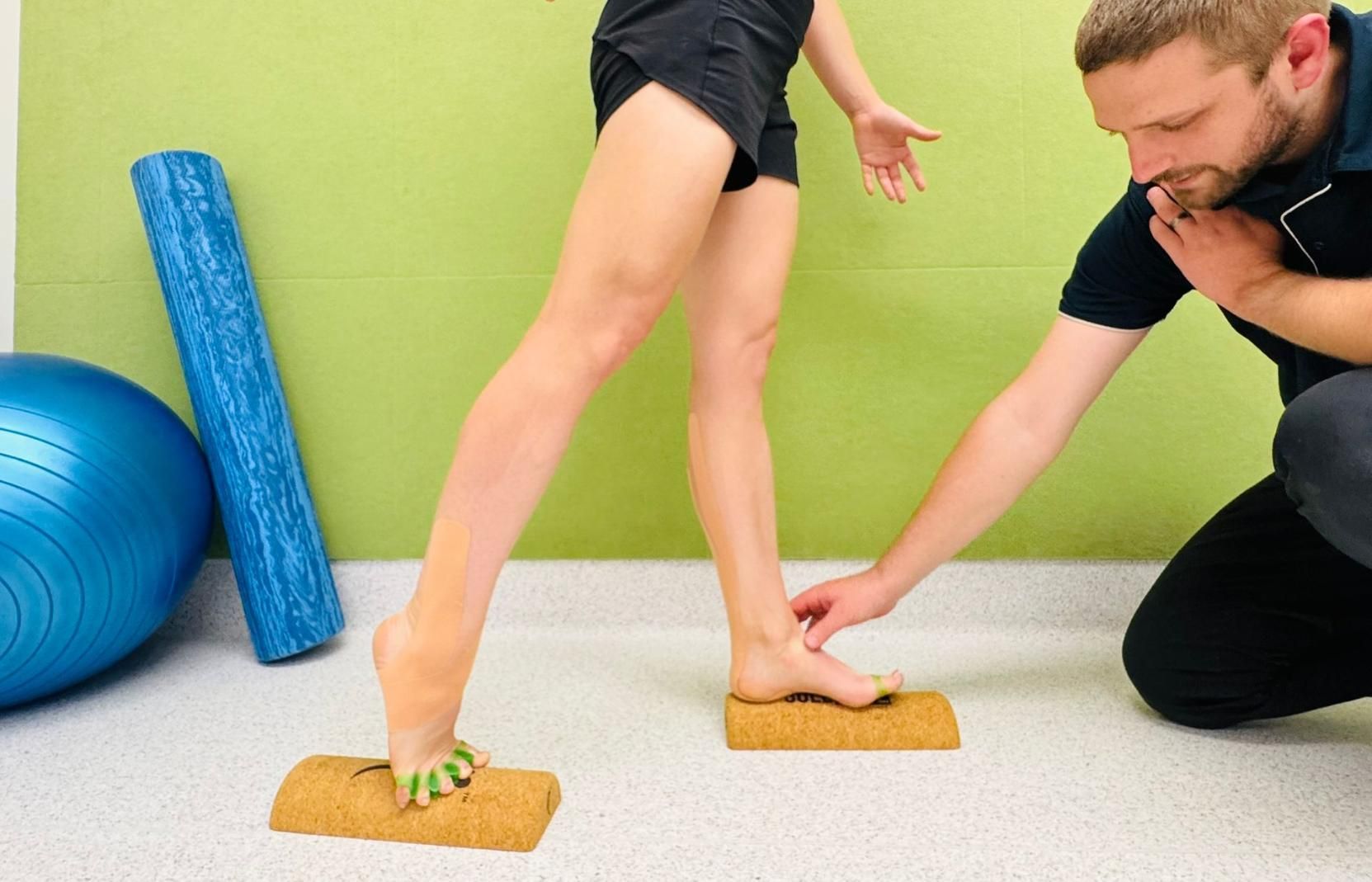 A Person Balances on One Foot on a Cork Block — Alice Springs Podiatry in Ciccone, NT