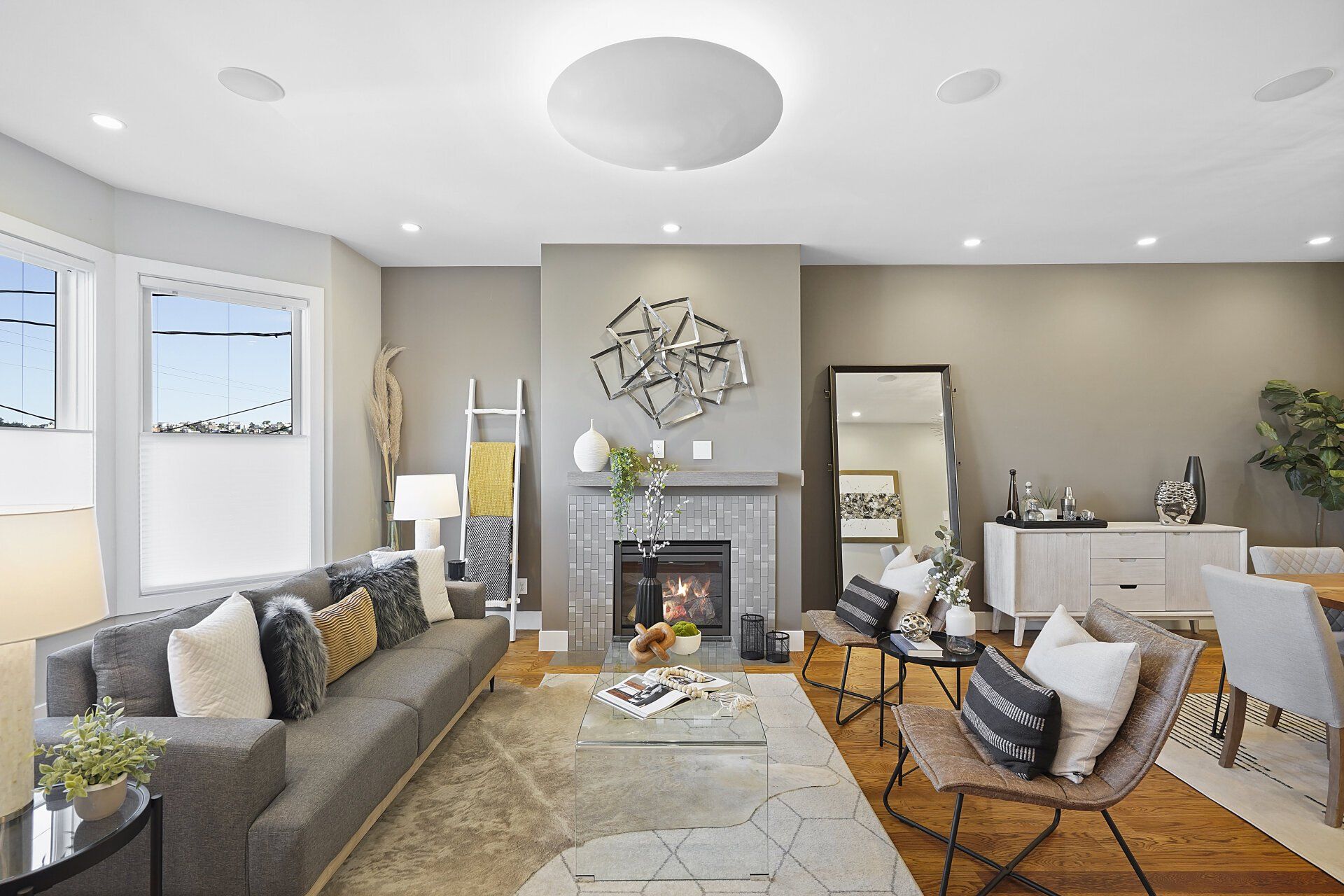 A living room with a fireplace and a couch.