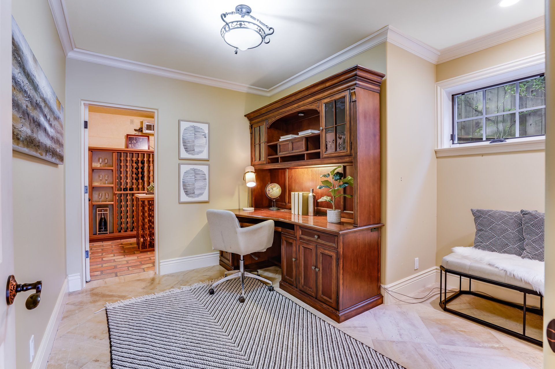 A home office with a desk and chair