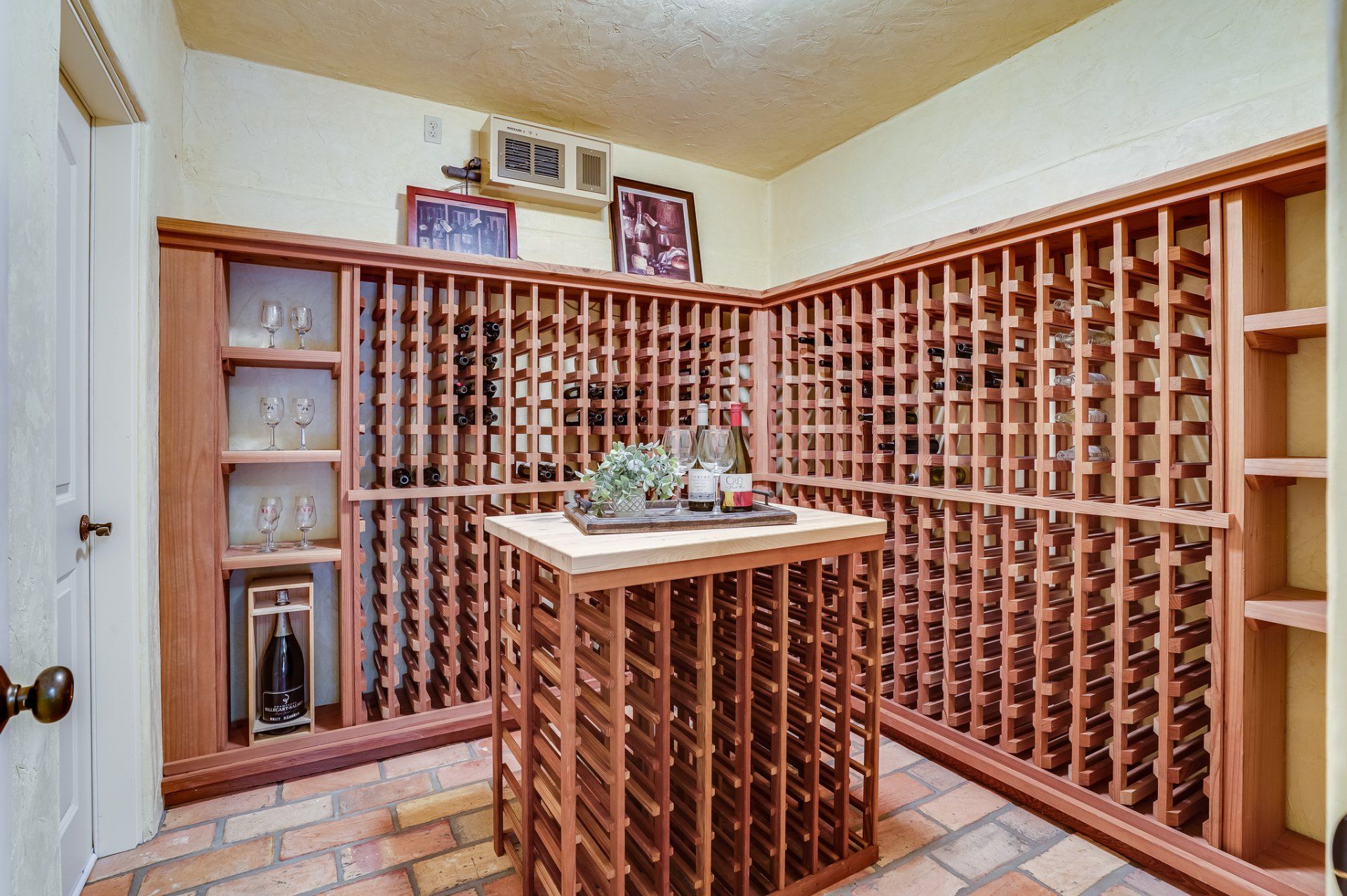 A large wine cellar with a table in the middle