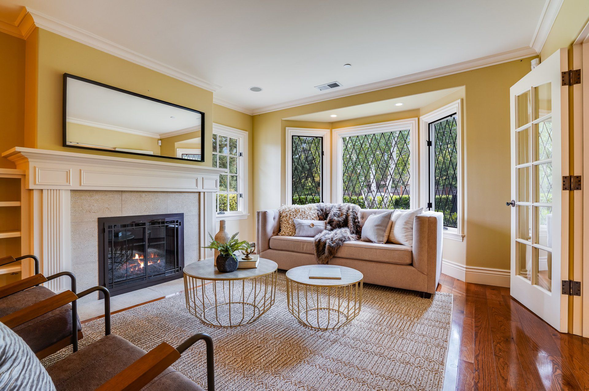A living room with a fireplace and a couch