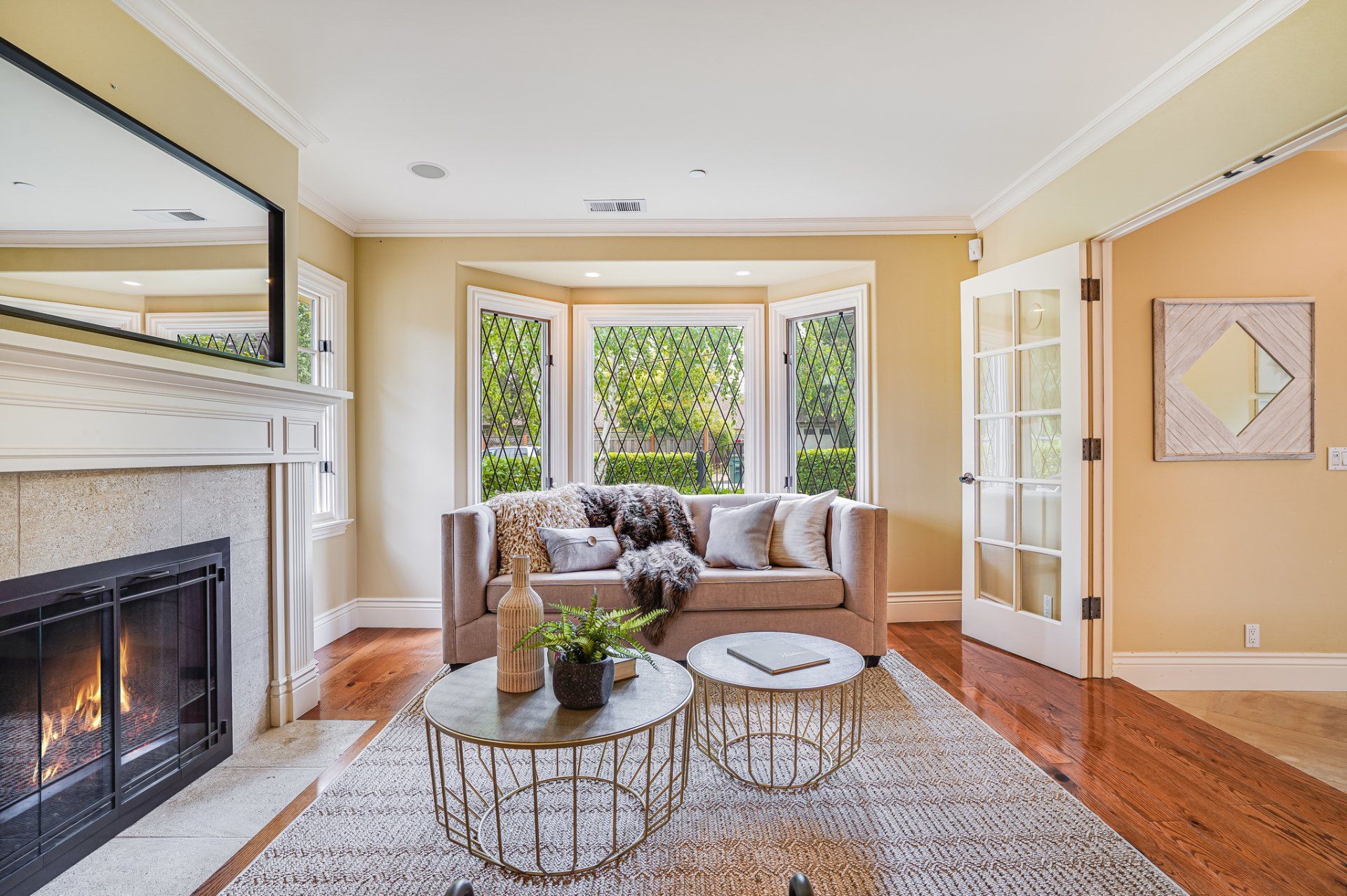 A living room with a fireplace and a couch