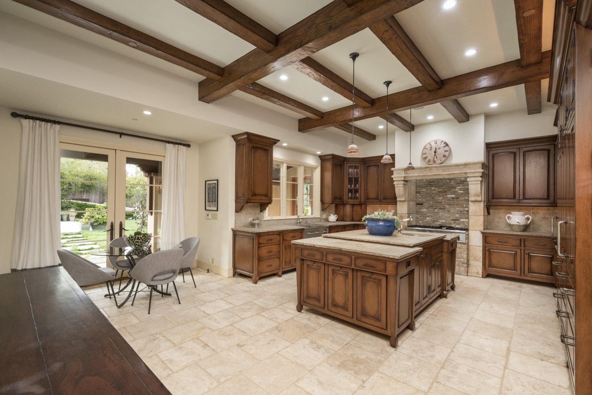 A kitchen with a large island in the middle