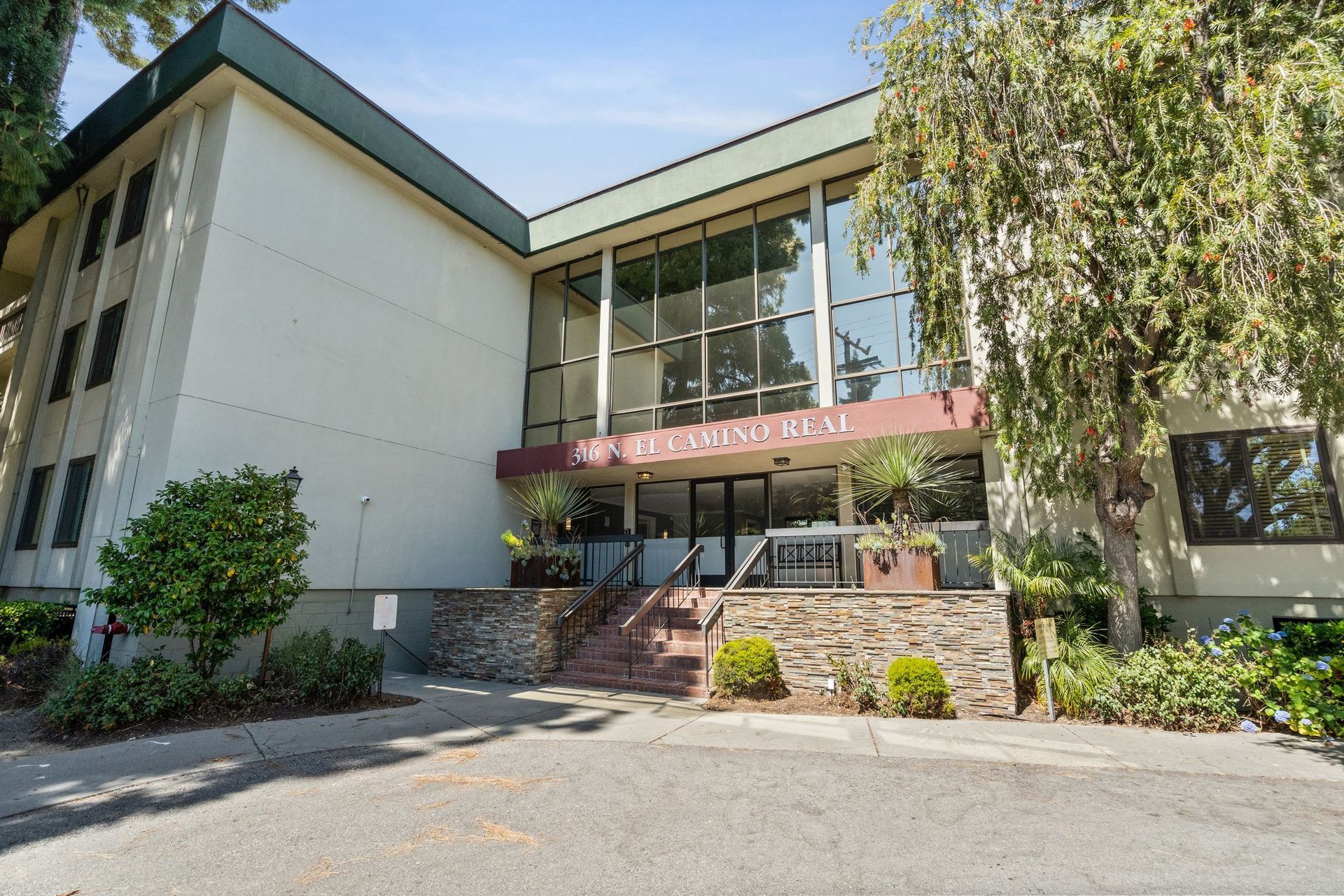 A large building with stairs leading up to it.