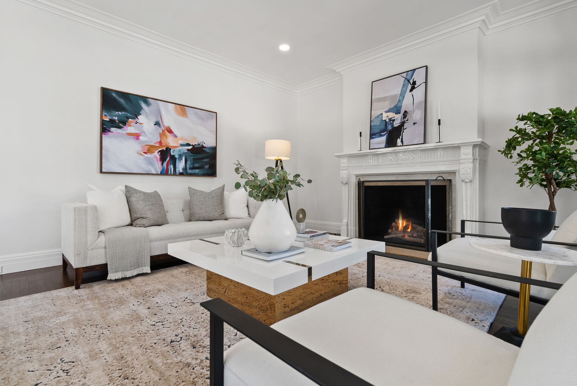 A living room with a fireplace and a couch