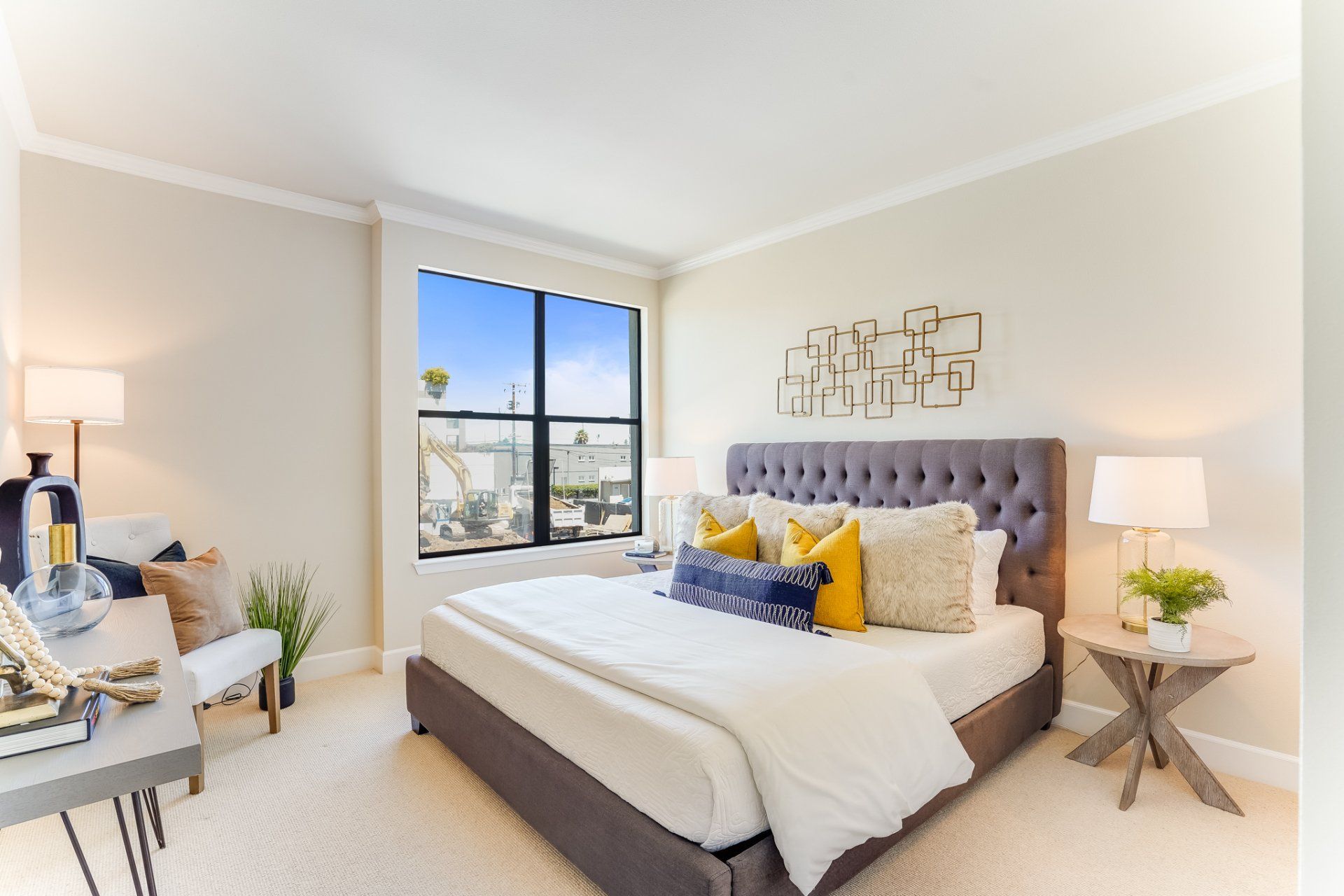 A bedroom with a large bed and a window