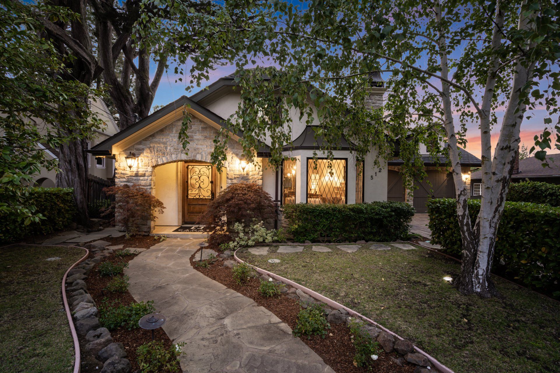 A house with a walkway leading to it