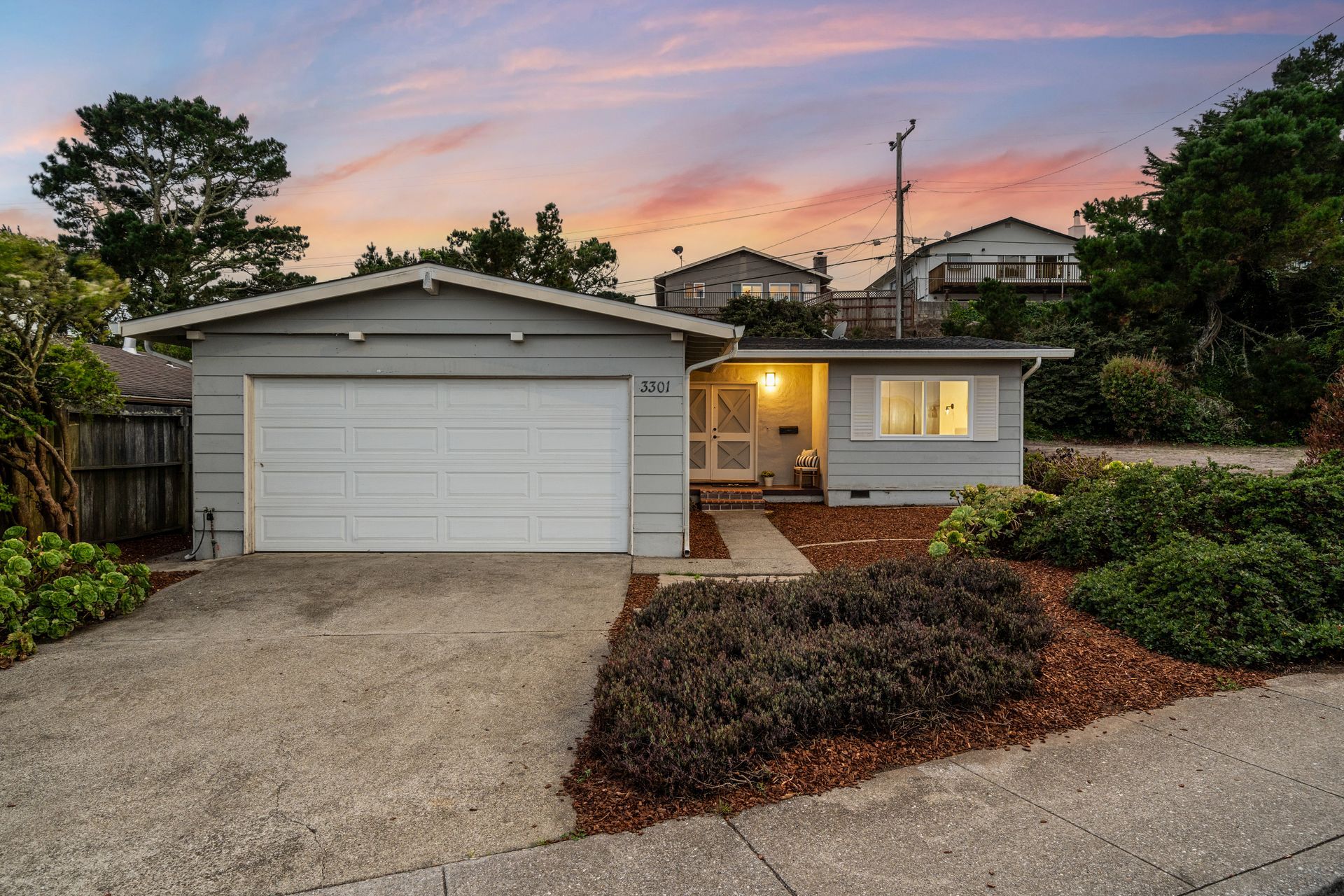 A house with a white garage door.
