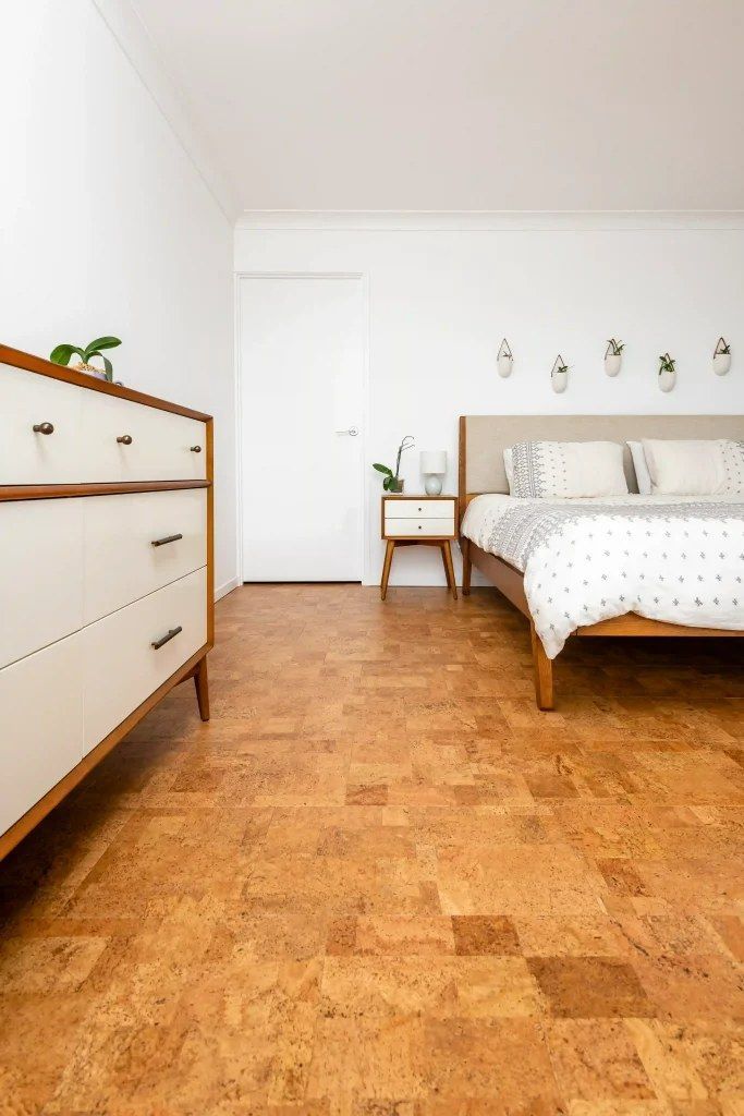 Bedroom With White Walls and Cork Floors — Canberra Floor Coverings in Queanbeyan West, NSW