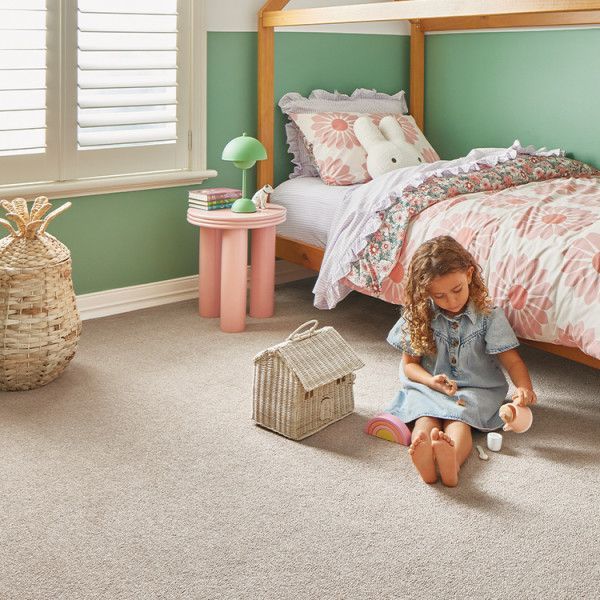 Child Playing in a Colourful Bedroom and Grey Carpet — Canberra Floor Coverings in Queanbeyan West, NSW
