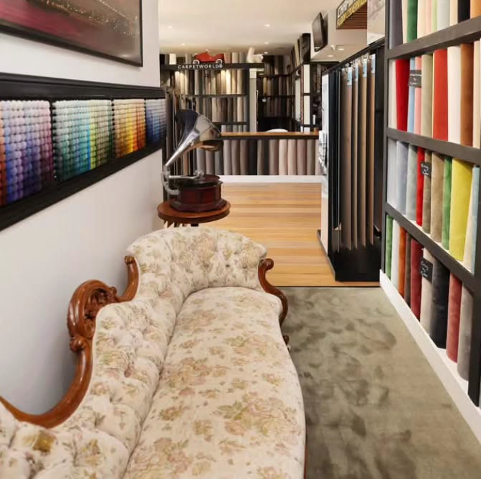 Grey Carpet With a Marble-topped Coffee Table — Canberra Floor Coverings in Queanbeyan West, NSW
