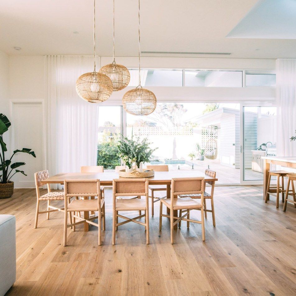 Light-Filled Dining Room With Wood Table — Canberra Floor Coverings in Queanbeyan West, NSW