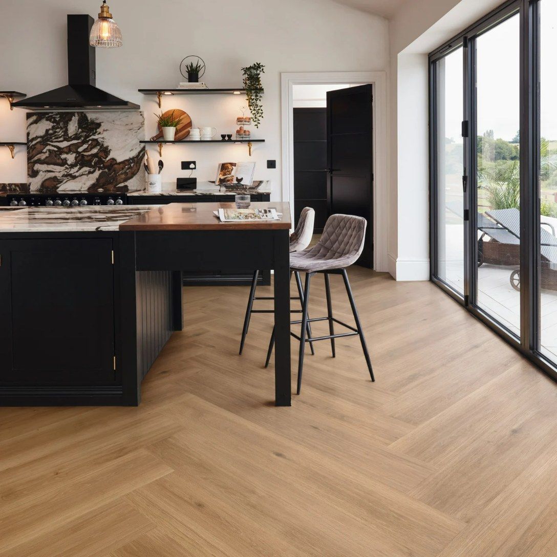 Modern Kitchen With Herringbone Wood Floors — Canberra Floor Coverings in Queanbeyan West, NSW