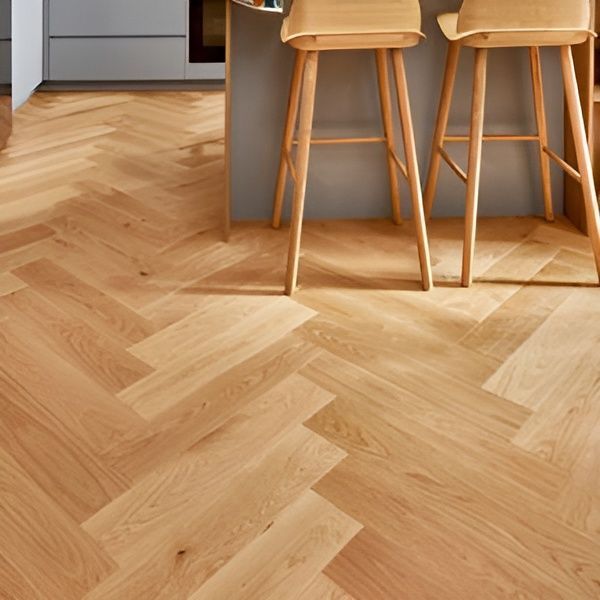 Herringbone Wood Flooring With Light Wooden Bar — Canberra Floor Coverings in Queanbeyan West, NSW
