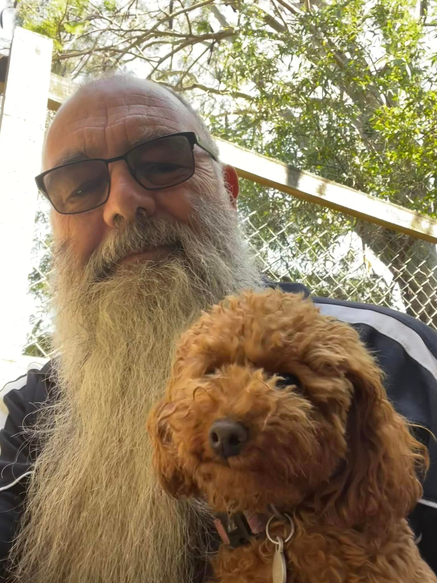 Lester With Small Dog — Yeppoon Boarding Kennels & Cattery In Farnborough, QLD