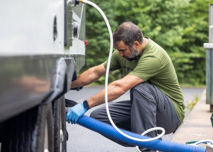 Man performing RV Pumping Service in Chico, CA