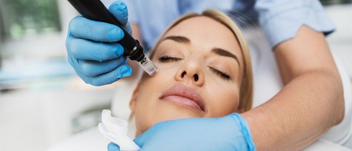 Woman Undergoing Skin Tone Treatment - Metairie, Louisiana - Mekari Dental Studio and SPA