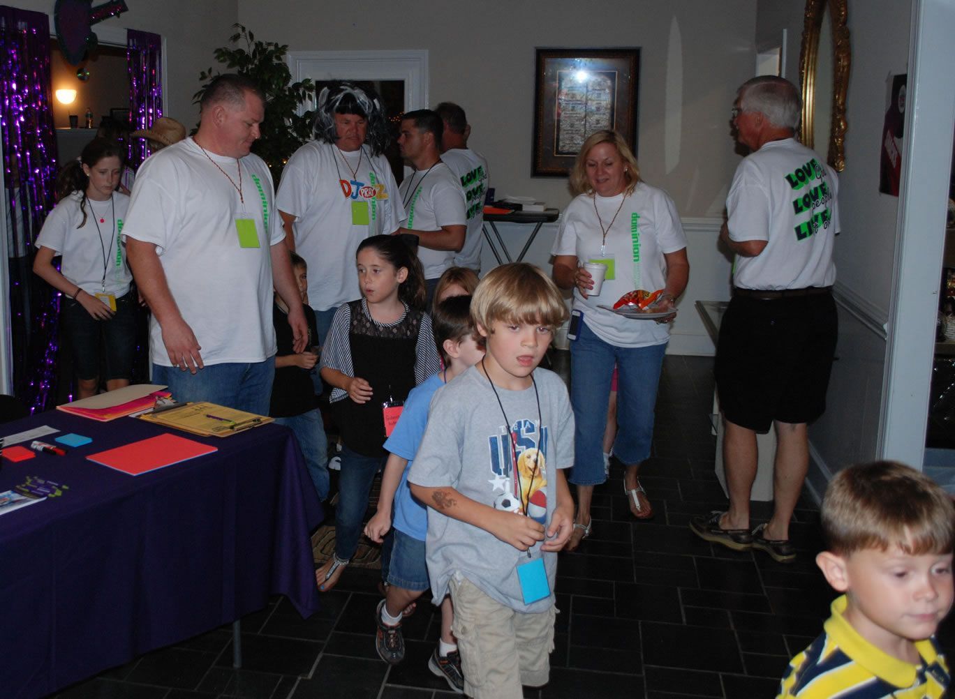 A group of people wearing white shirts with the word hope on them