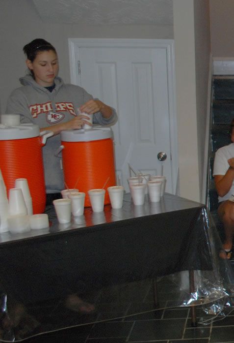 A woman wearing a hoodie that says ' chicago ' on it