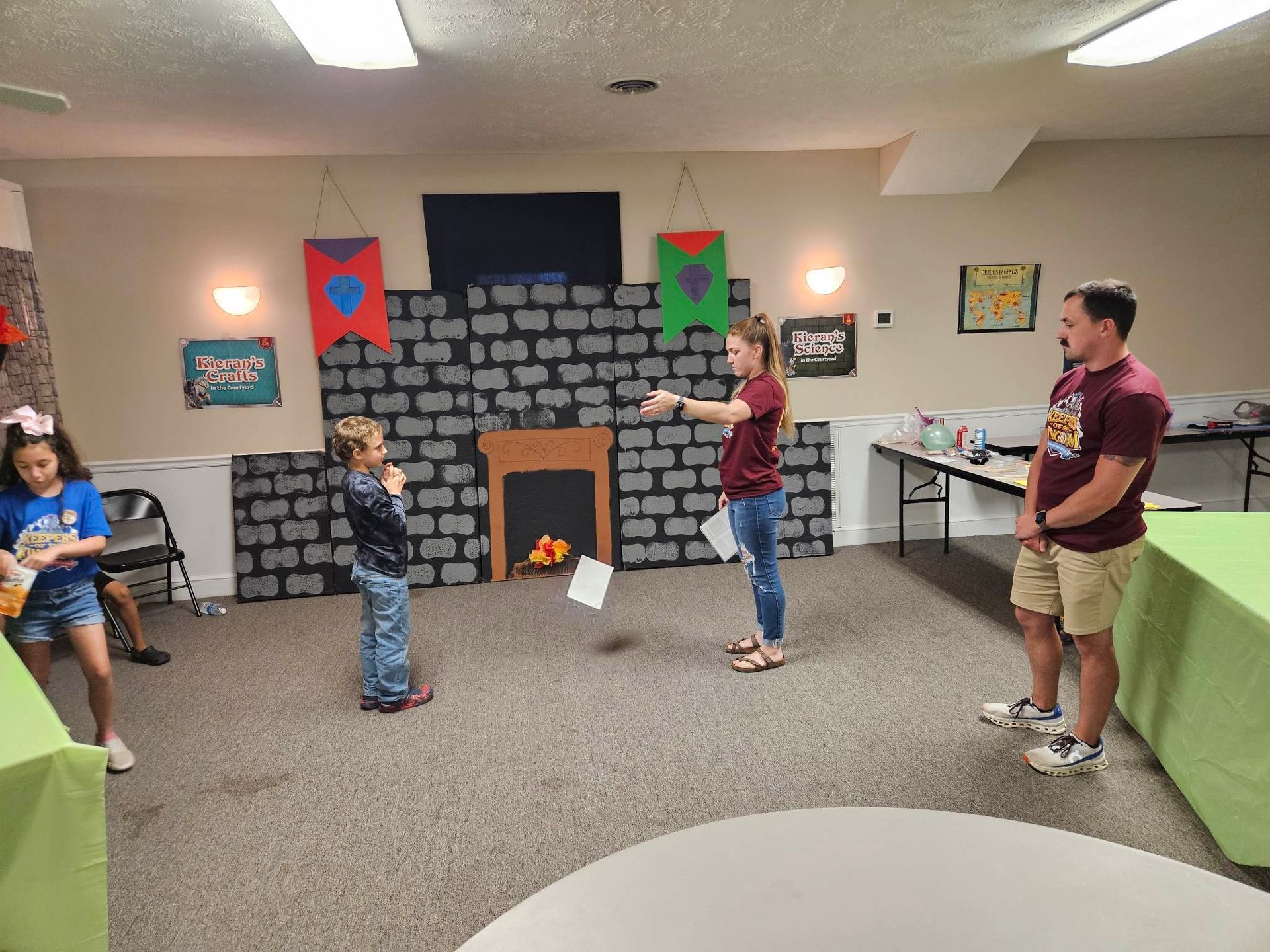 A group of people are playing a game in a room.