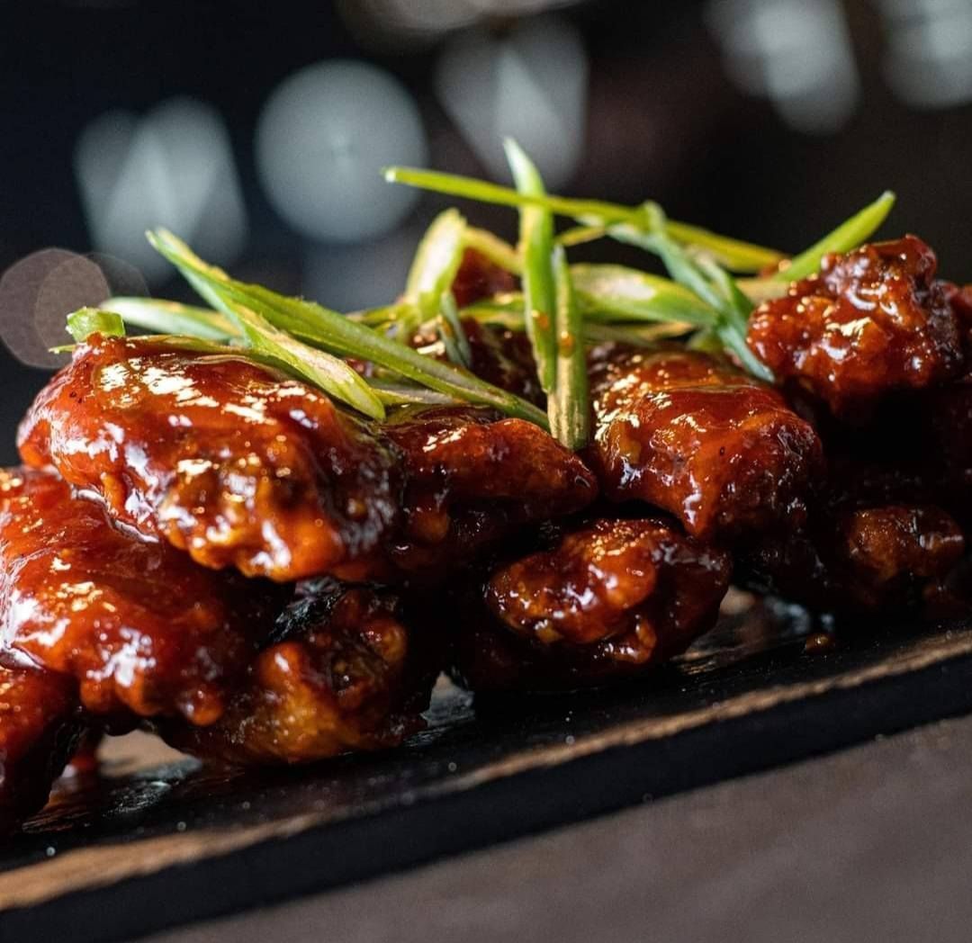Wings displayed on a cutting board