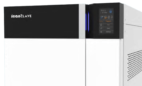 Black and white autoclave machine with a digital display showing settings. 