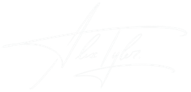 Signature of Alex Taylor, white script on white background.