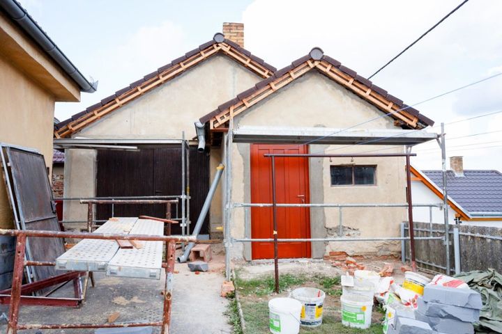 A house is being remodeled. With professional foundation repair and waterproofing