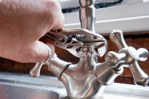 tightening water faucet