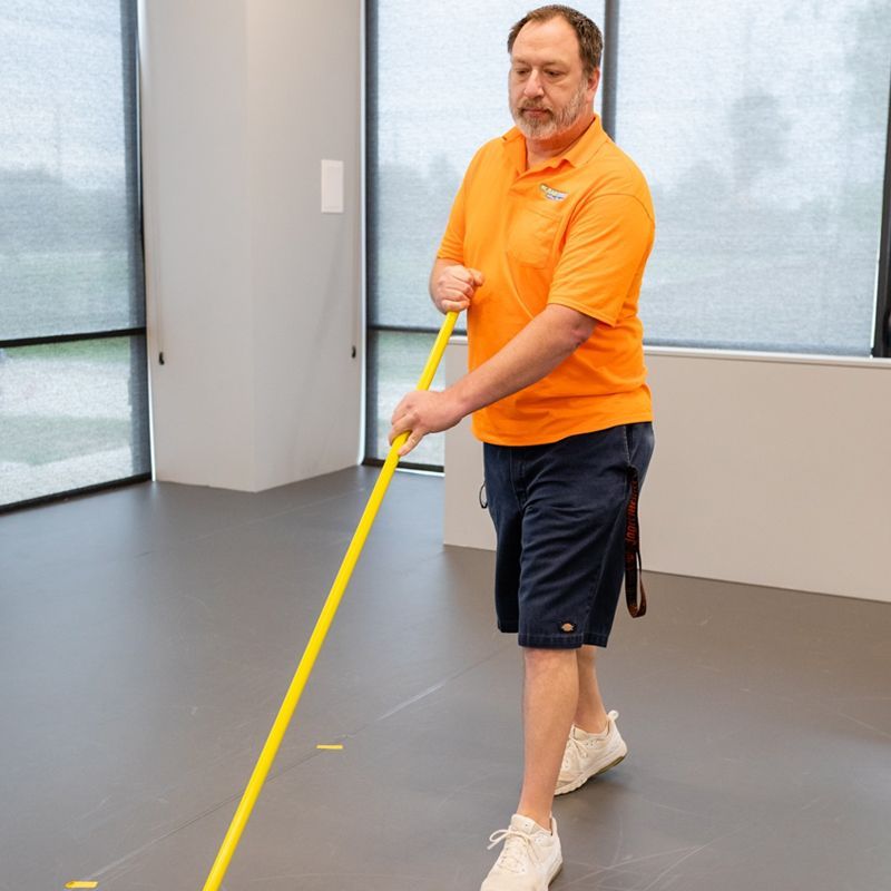 Man Cleaning The Floor