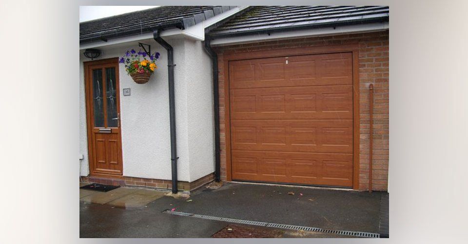 Sectional garage doors 