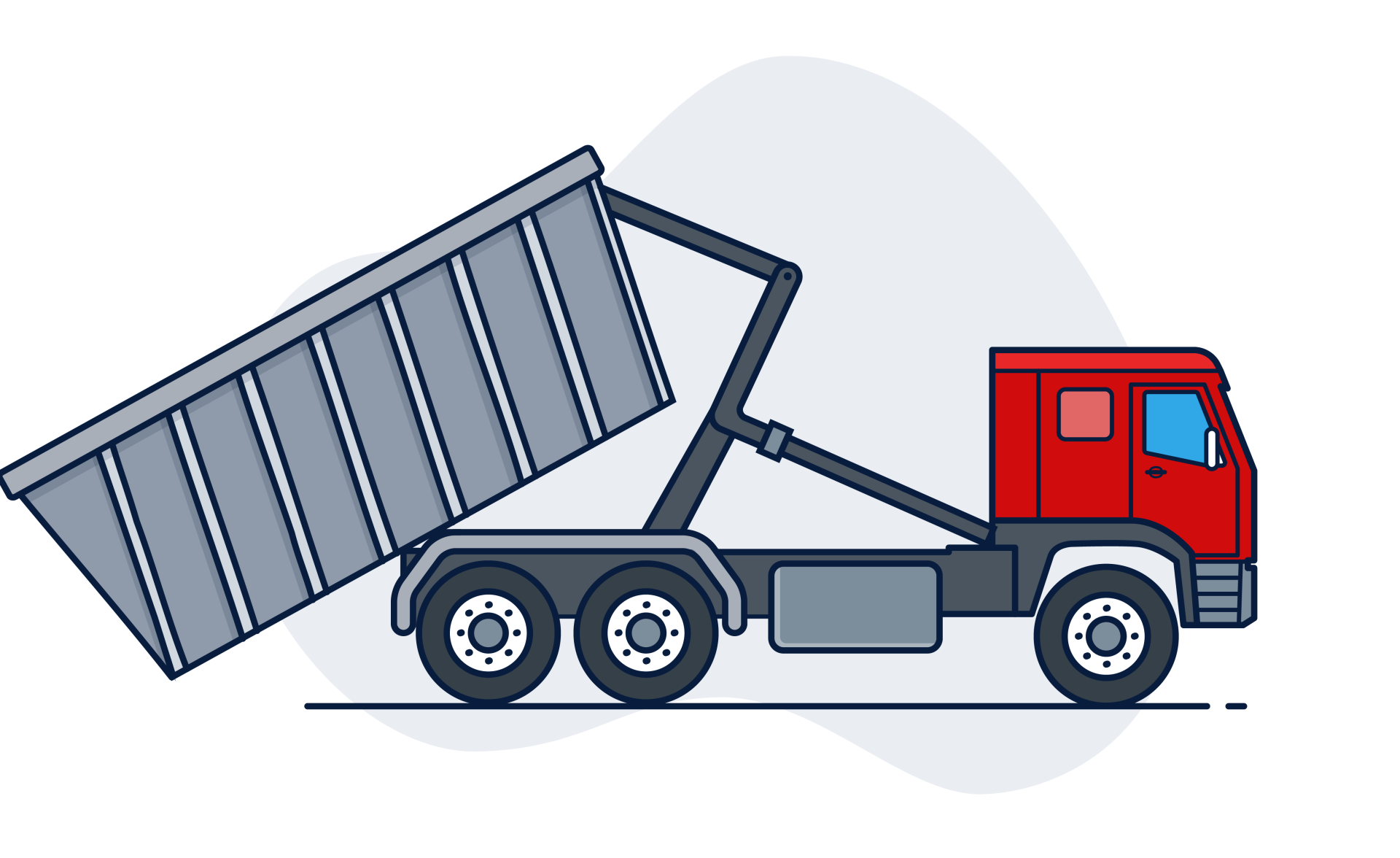 Red dump truck, bed raised, unloading materials.