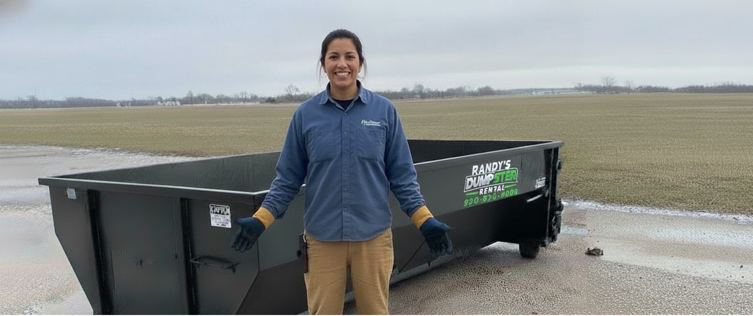 Woman in red hoodie stands by a black dumpster; company logo in the corner.