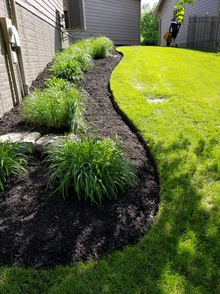 Beautifully Arranged Flower Garden — Omaha, NE — Omaha Lawnscaping Solutions