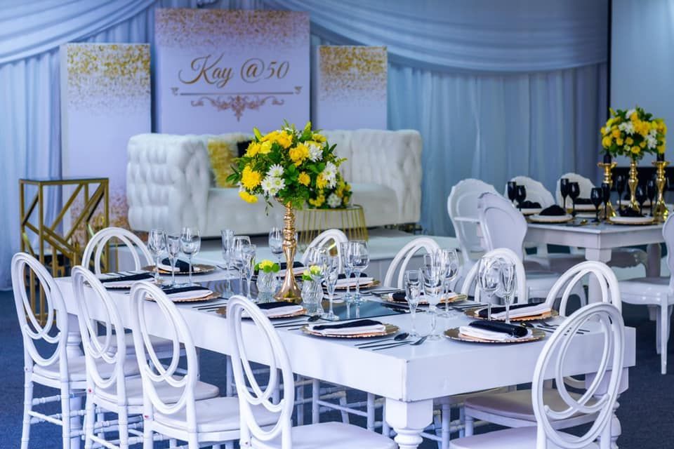 A table and chairs are set up for a wedding reception.