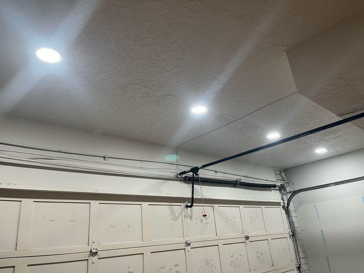 A garage door with a ceiling light on it.