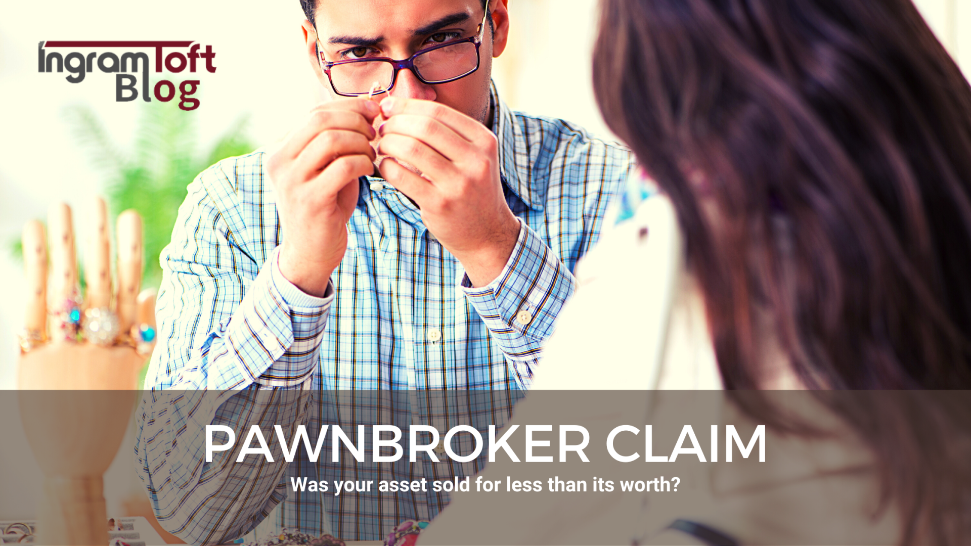 A man and a woman are looking at a pawnbroker claim.