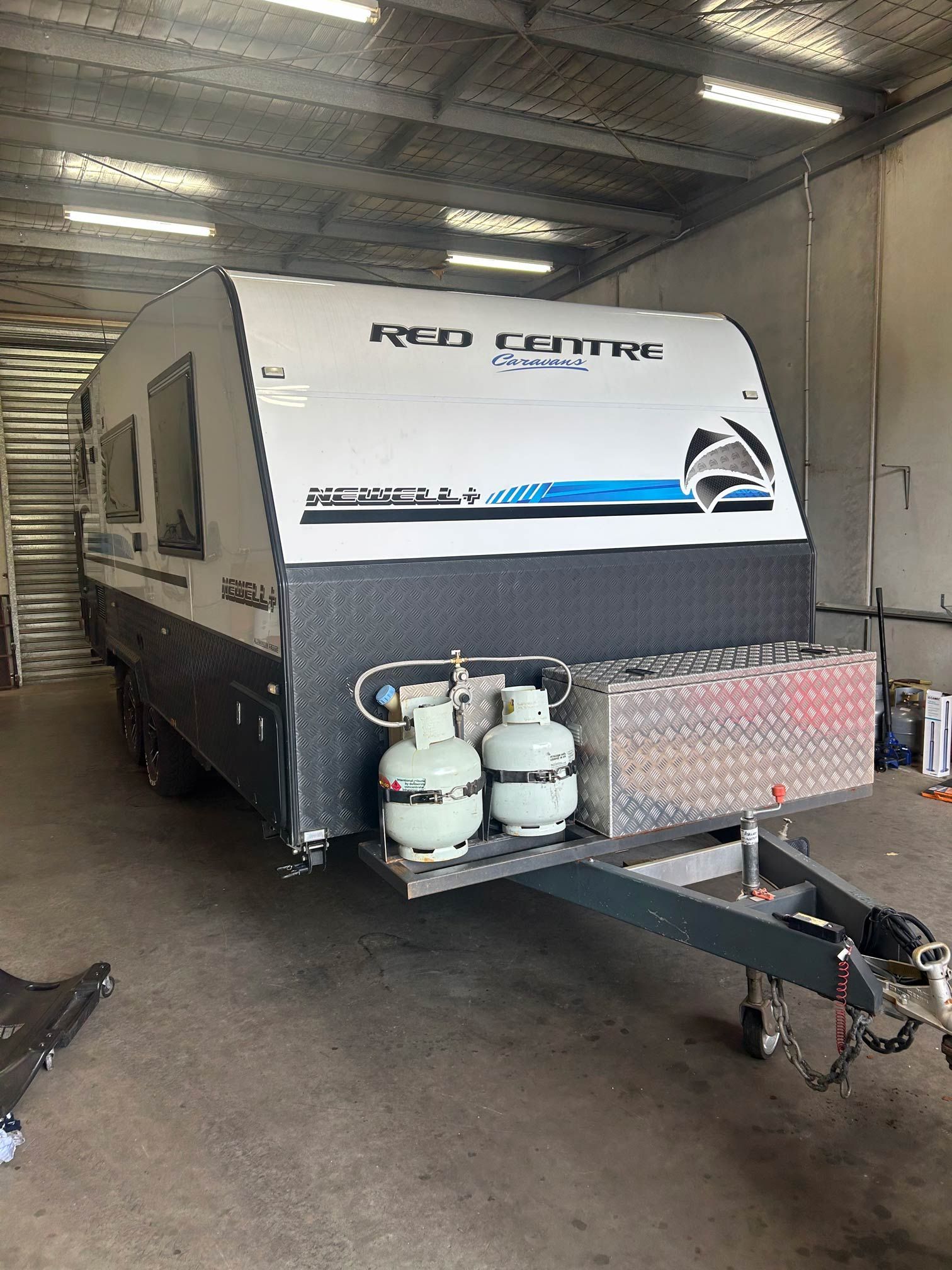 white and red rv with stars