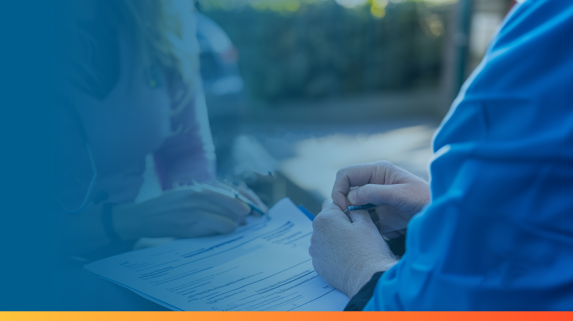 A nurse writing notes with a patient