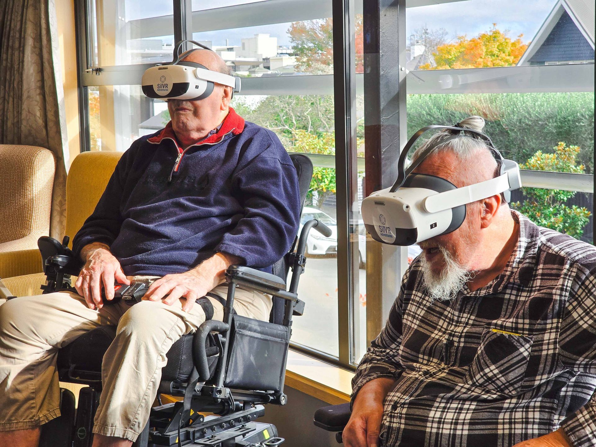 Care Home residents wearing VR Headsets