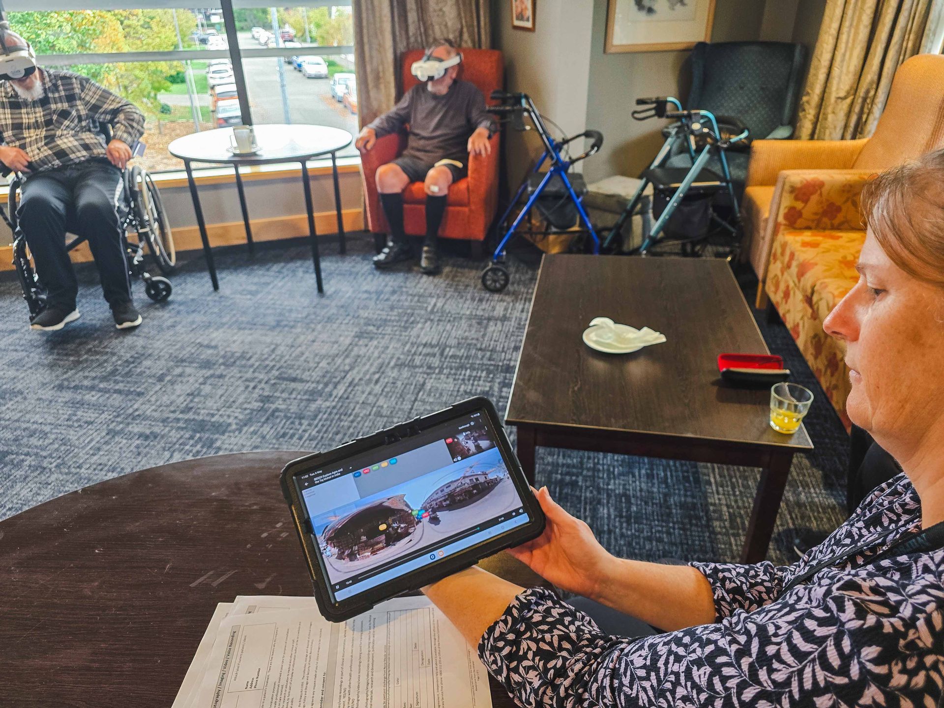 Care Home activites coordinator showing the SilVR control panel