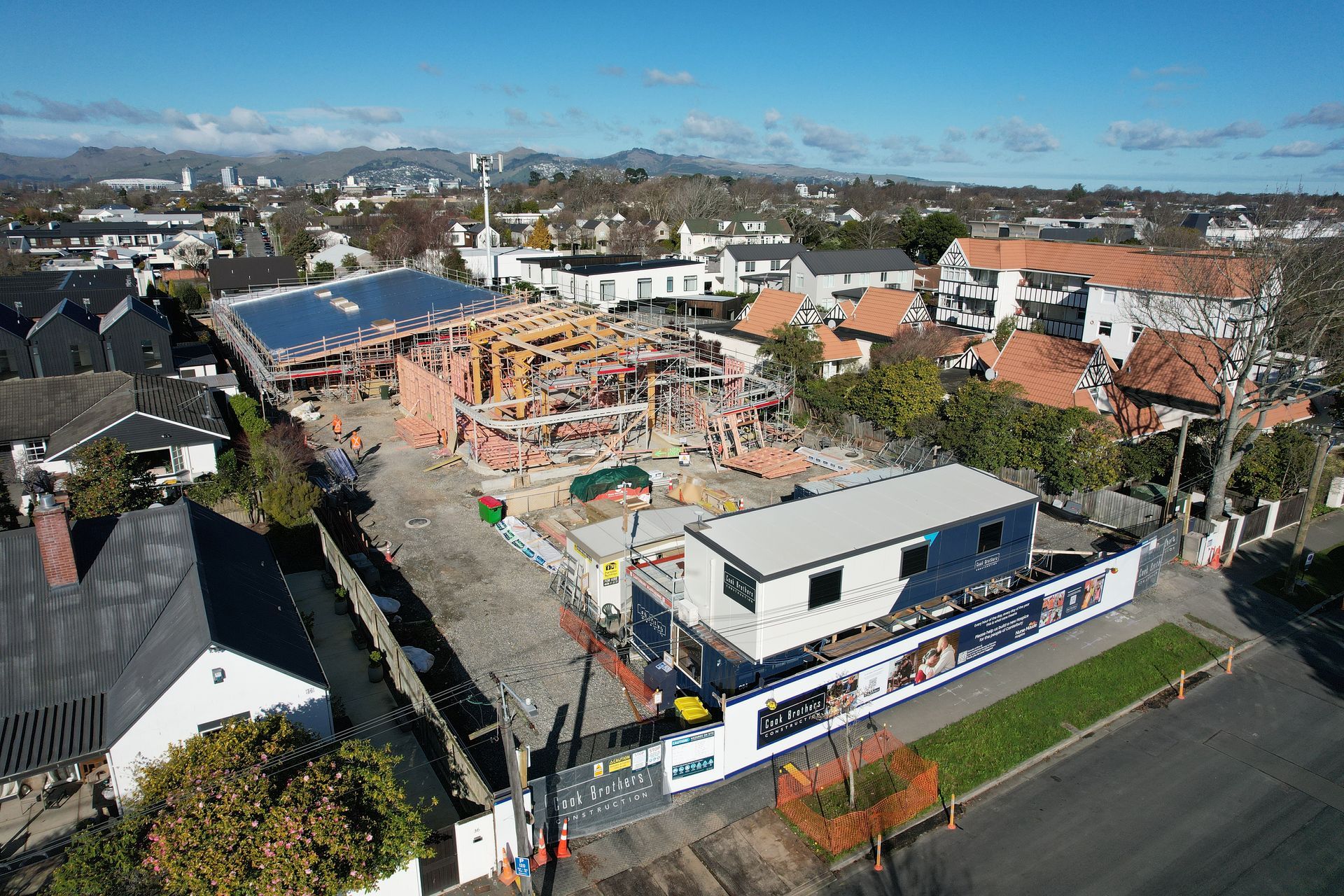 A building site with framing going up