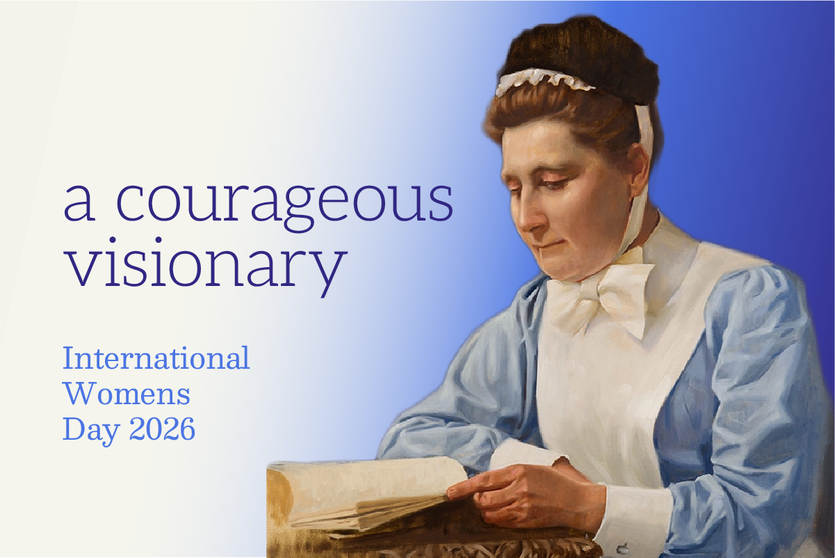 Seven nurses in white uniforms stand with bicycles outside a District Nursing Office.