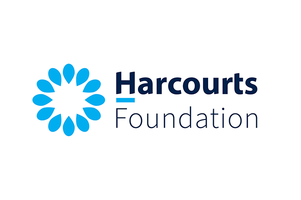 The harcourts foundation logo has a blue flower on it