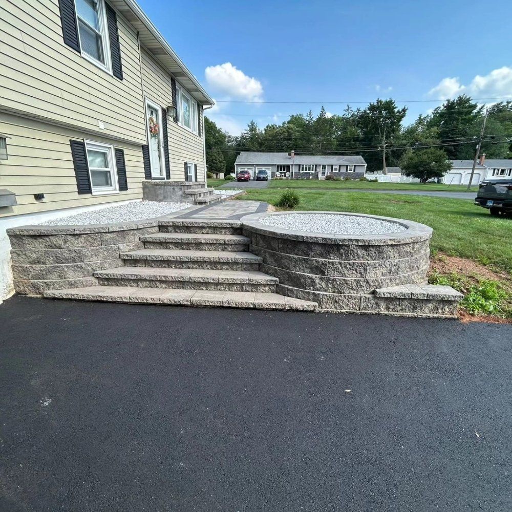 A house with stairs leading up to the front door