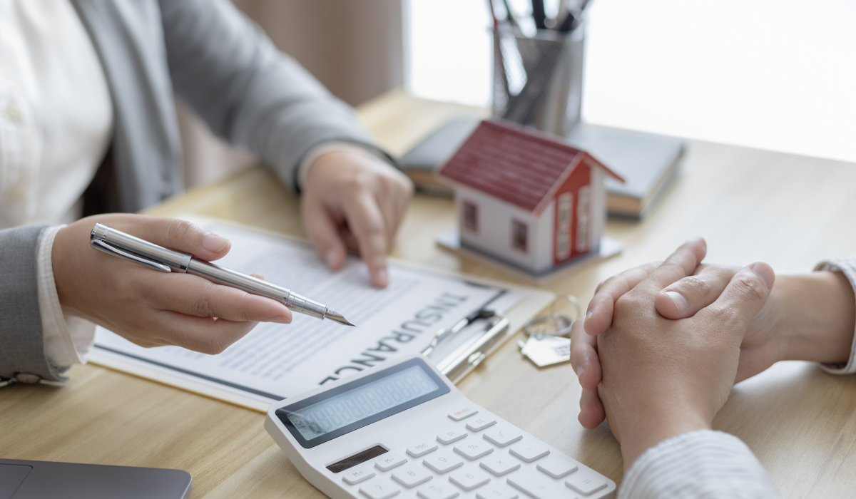 An estate professional assessing property documents and assets for valuation and appraisal purposes.
